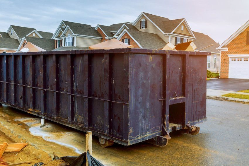 Roll-off container delivered to a residential street